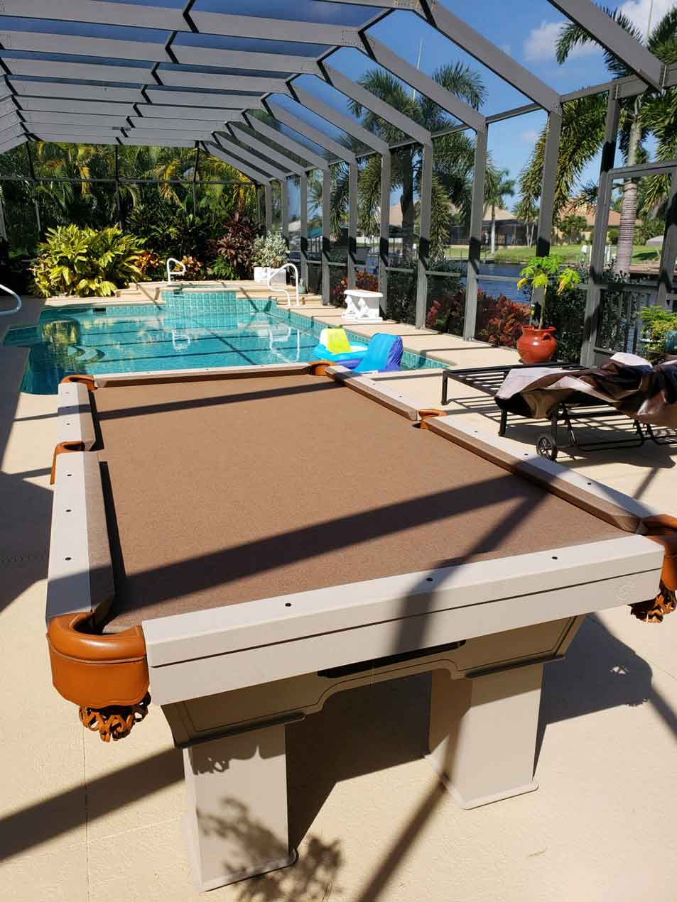 Beige & Brown Caesar Custom Outdoor Pool Table in Client's Southwest Florida Lanai from R&R Outdoors, Inc. All Weather Billiards