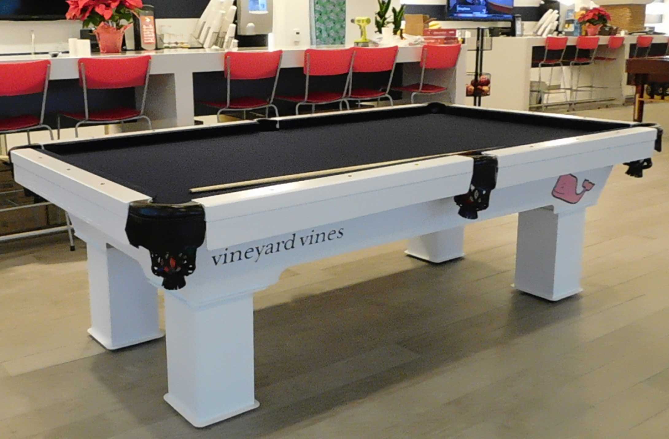 Vineyard Vine's custom outdoor pool table with company logo from R&R Outdoors All Weather Billiards