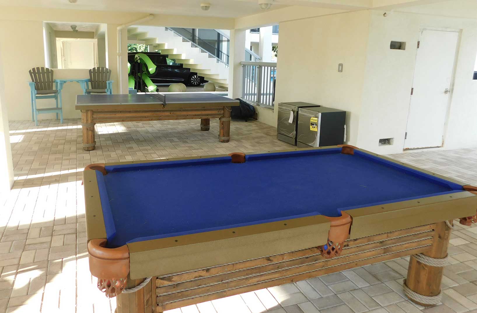 Southwest Florida home with Caribbean Outdoor Pool Table and Caribbean Outdoor Table Tennis Table from R&R Outdoors All Weather Billiards