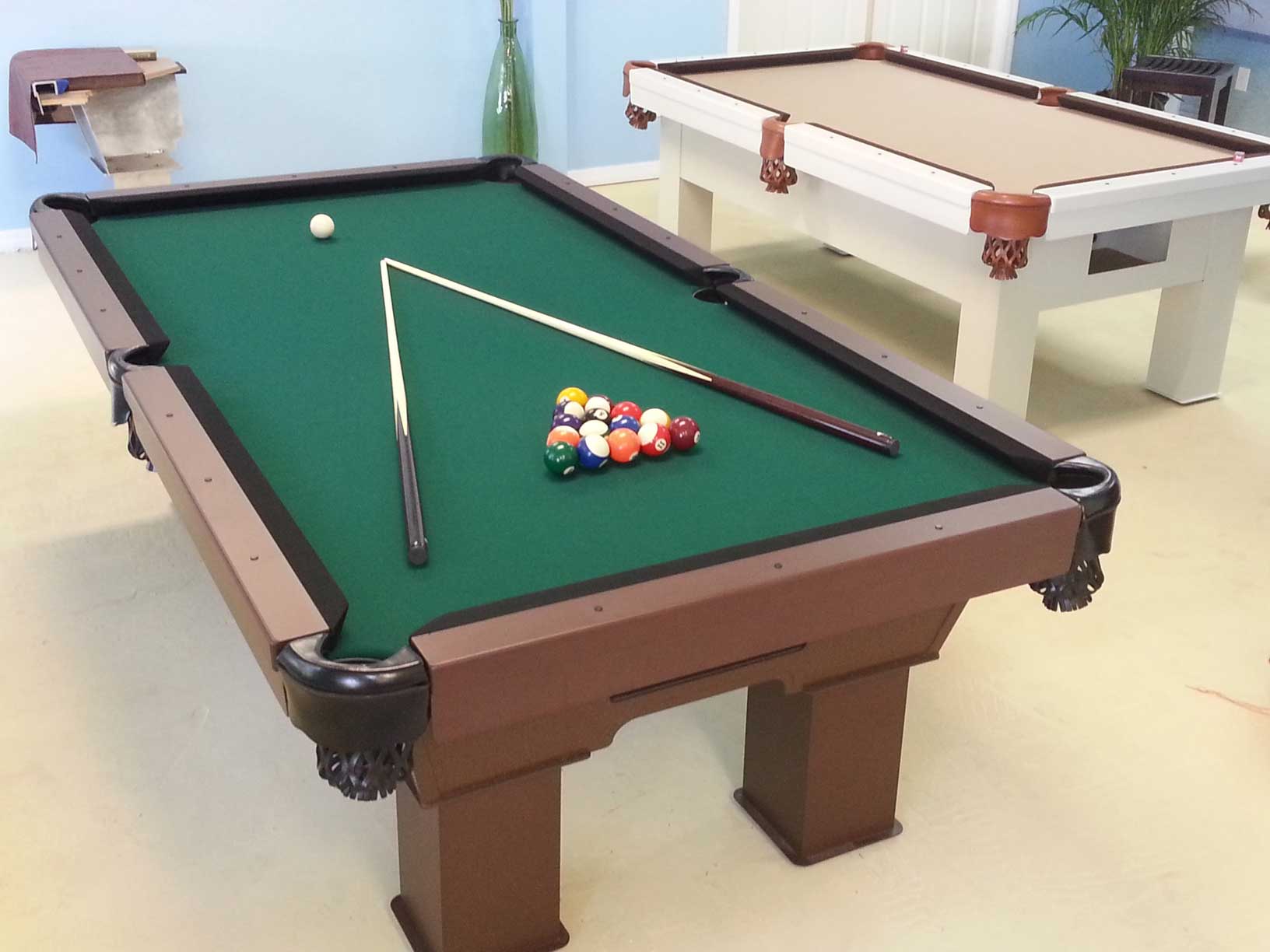 Caesar outdoor pool table in R&R Outdoors All Weather Billiards showroom in Naples, Florida