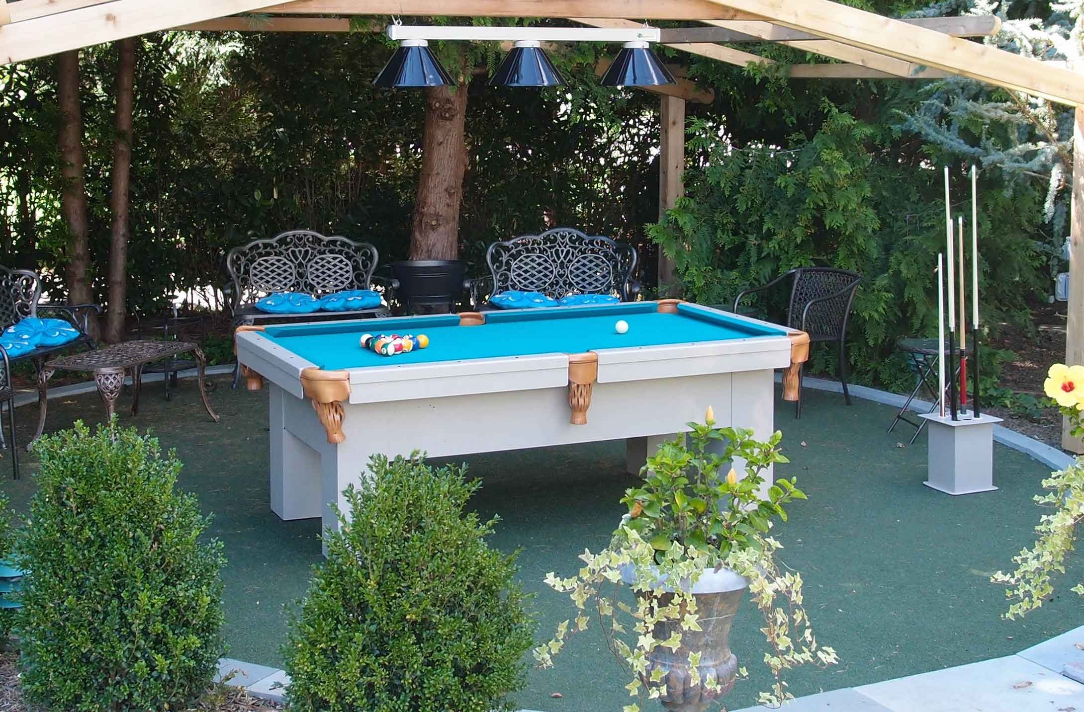 Orion custom pool table as the focal point of client's outdoor living space