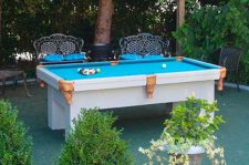 Orion custom pool table as the focal point of client's outdoor living space