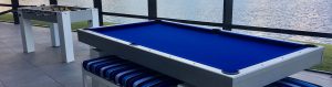 South Beach model custom outdoor pool table alongside custom foosball game table in client's Southwest Florida lanai