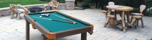 Oasis outdoor pool table in outdoor living space