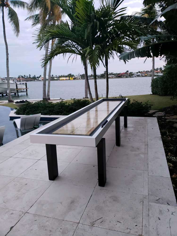 Outdoor Shuffleboard Table Waterfront in Southwest Florida Home by R&R Outdoors, Inc.