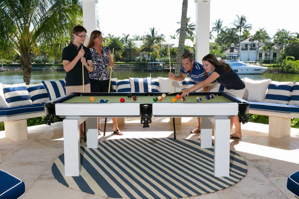R&R Outdoors, Inc. All Weather Riley Pool Table being enjoyed by a Florida Family