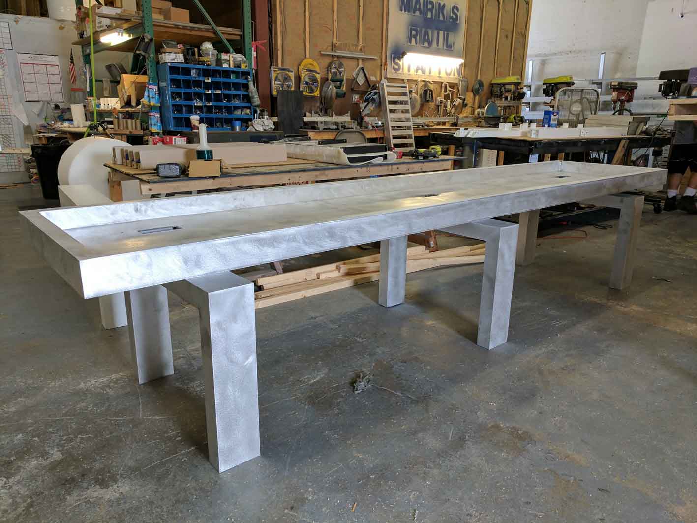 Custom outdoor shuffleboard table in production at R&R Outdoors All Weather Billiards manufacturing facility
