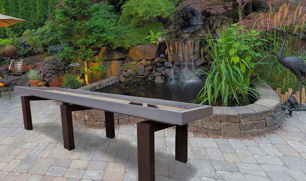 R&R Outdoors Rock Solid Shuffleboard table in client's backyard