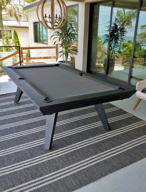 Sinatra outdoor pool table on residential balcony from R&R Outdoors All Weather Billiards