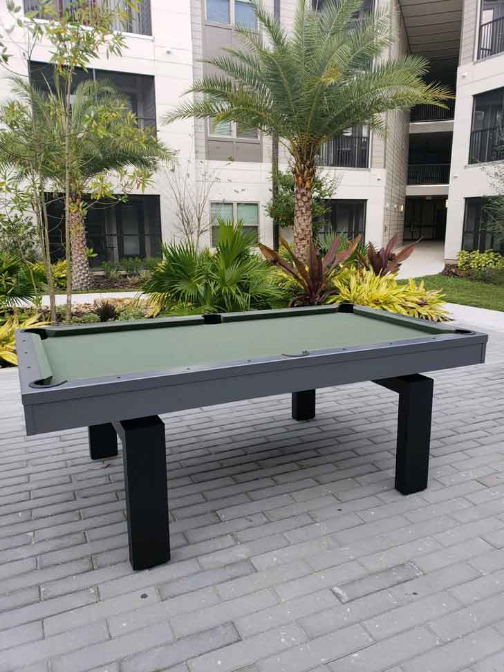 South Beach Outdoor Pool Table in Apartment Complex Courtyard
